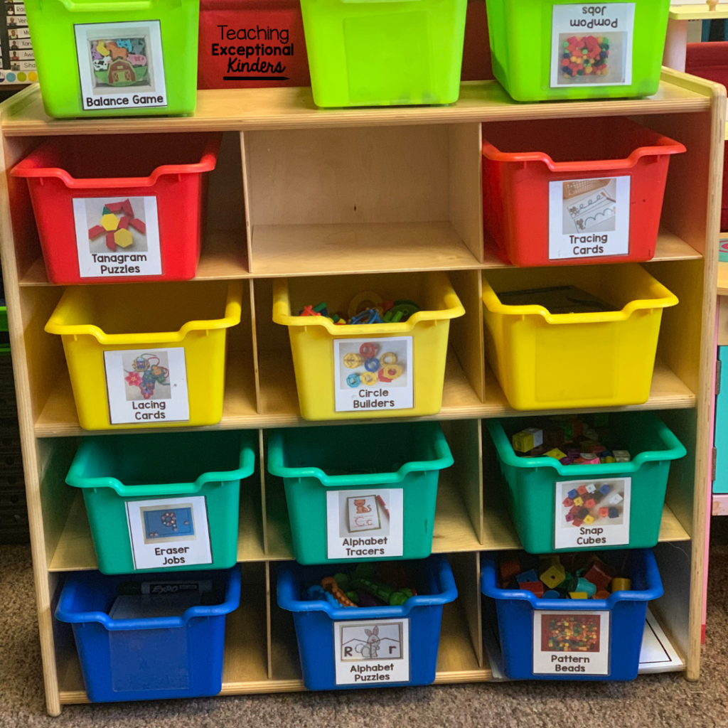 Colorful fast finisher tubs stored on a wood shelving unit