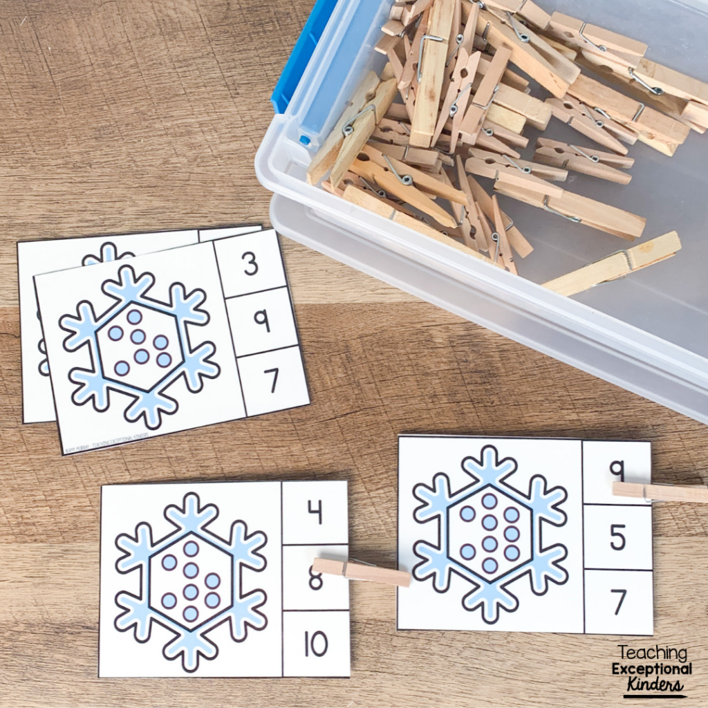 Adding clothespins to a counting task card