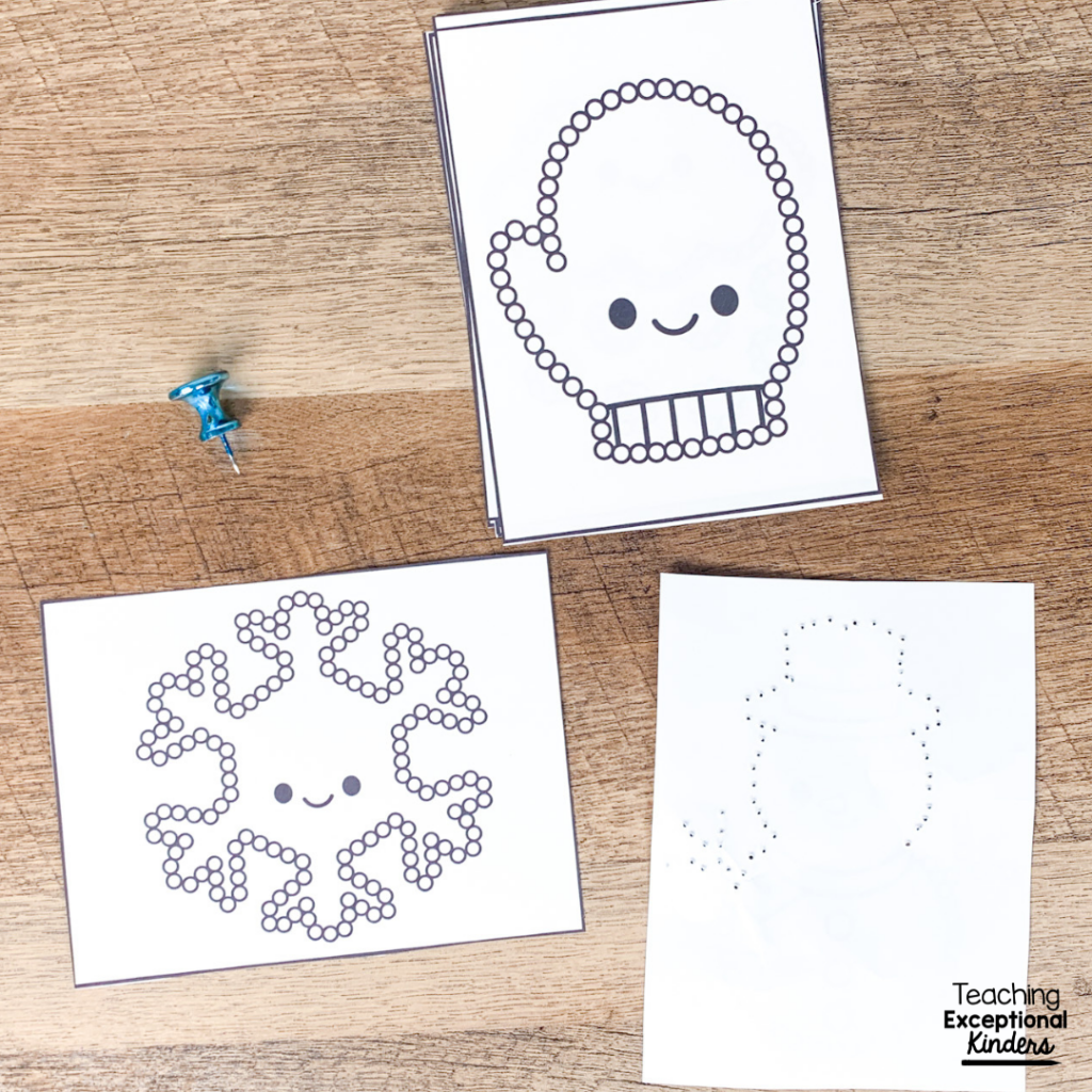 A push pin with winter themed task cards